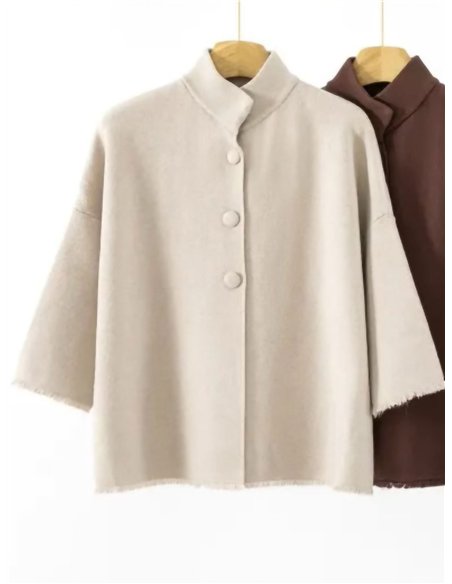 Chaqueta corta de punto cuello subido