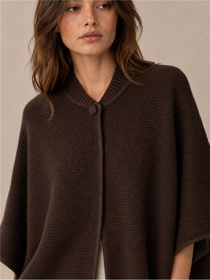 Poncho de punto botón
