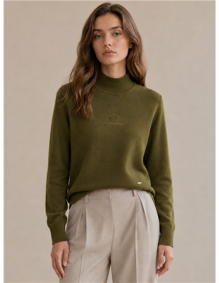 Jersey punto cuello alto flor relieve