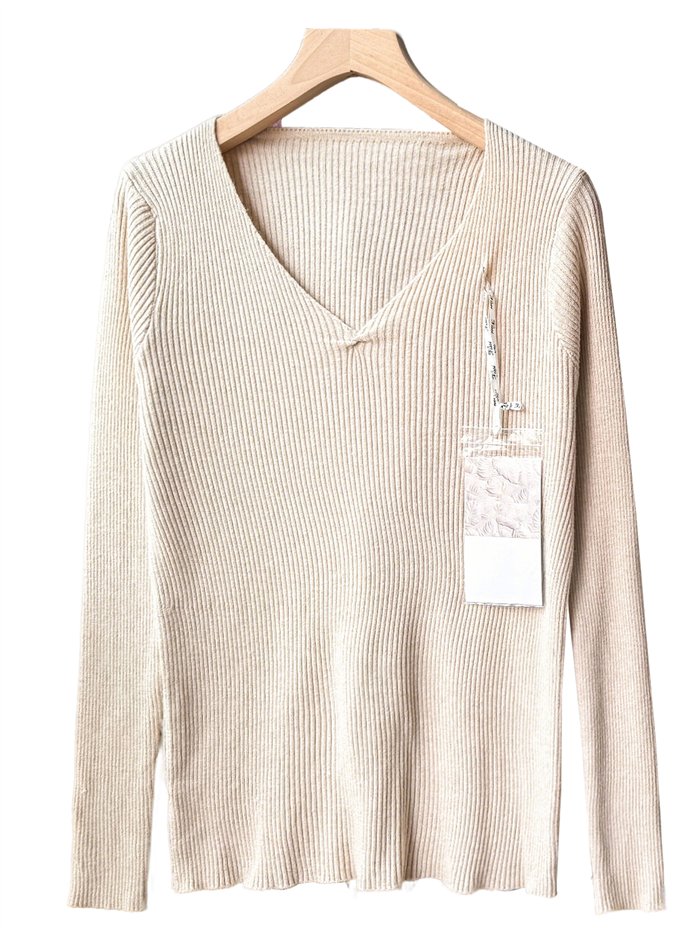 Jersey canalé cuello pico