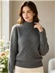 Jersey cuello alto rombos texturizados