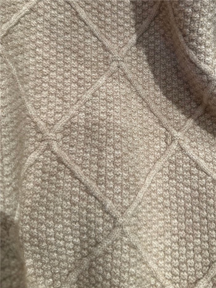 Jersey cuello alto rombos texturizados