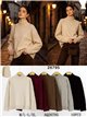 Jersey cuello alto mangas trenzadas