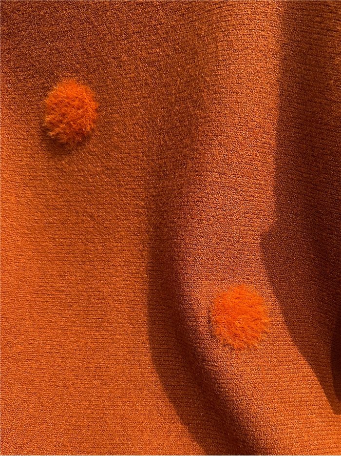 Jersey cuello alto pompones de pelo