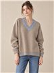 Jersey cuello pico trenzado contraste