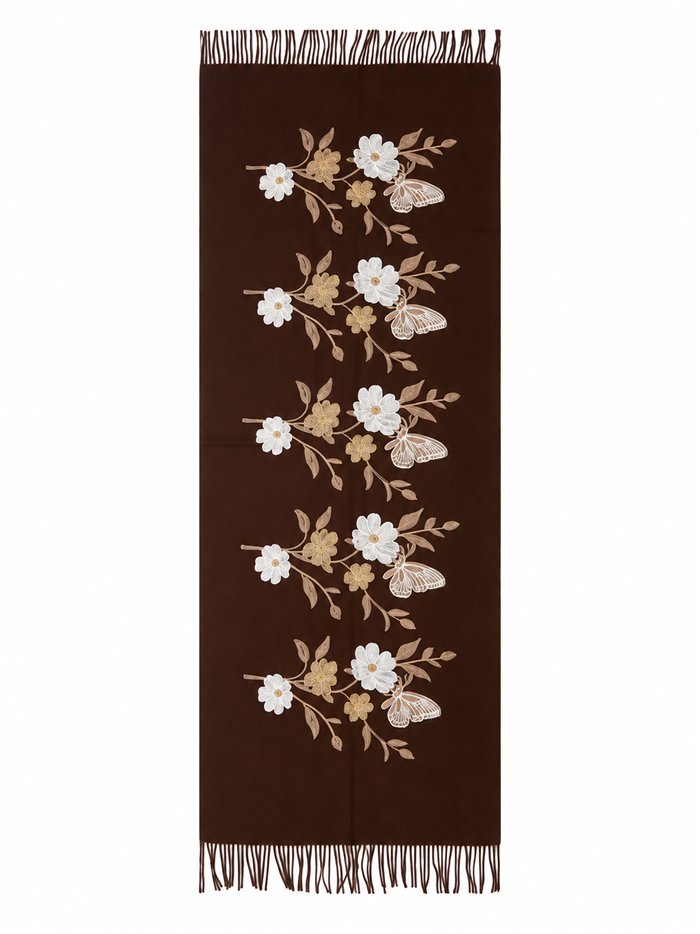Lenço com flores bordadas e franjas.