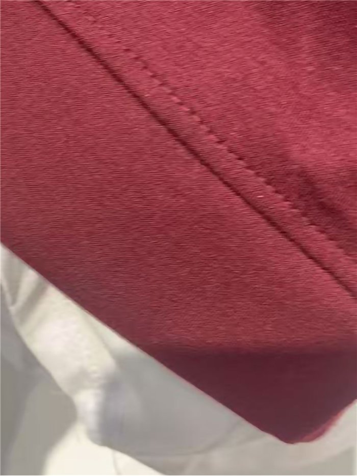 Sudadera amplia efecto camisa tachuelas