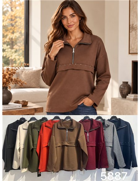 Sudadera amplia con cremallera y tachas