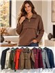 Sudadera amplia con cremallera y tachas