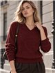Pull à paillettes à col en V et motif losanges