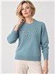 Maglia ricamata con motivi floreali