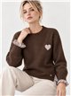 Jersey de lana corazón y volantes