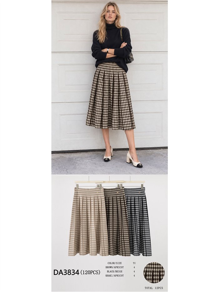 Falda midi de punto plisada de cuadros
