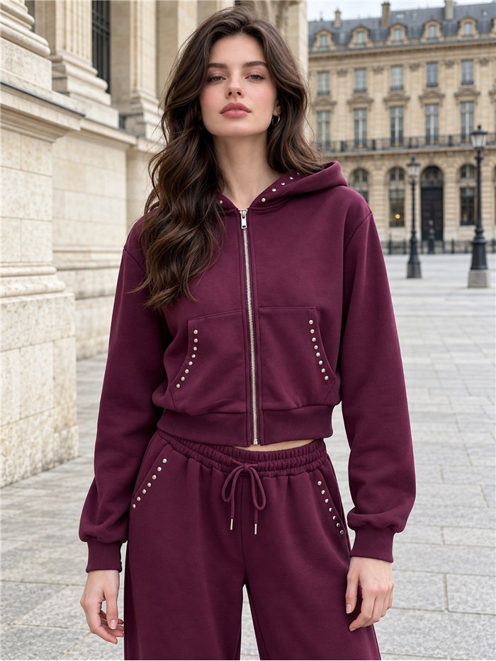 Sudadera tachuelas con cremallera