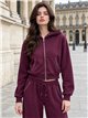 Sudadera tachuelas con cremallera