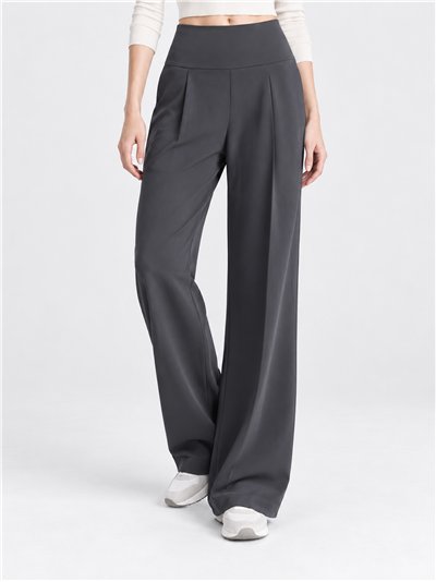Pantalón deportivo wide leg bolsillos