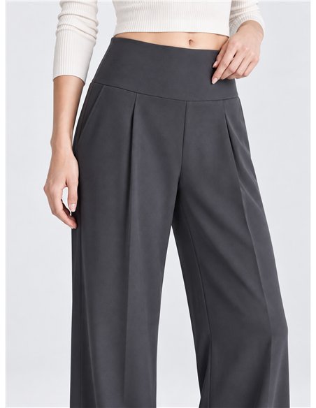 Pantalón deportivo wide leg bolsillos
