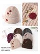 Gorro de punto con bordado de bayas