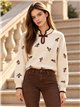 Pull brodé de fleurs avec nœud