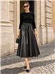 Falda midi efecto piel cintura elástica