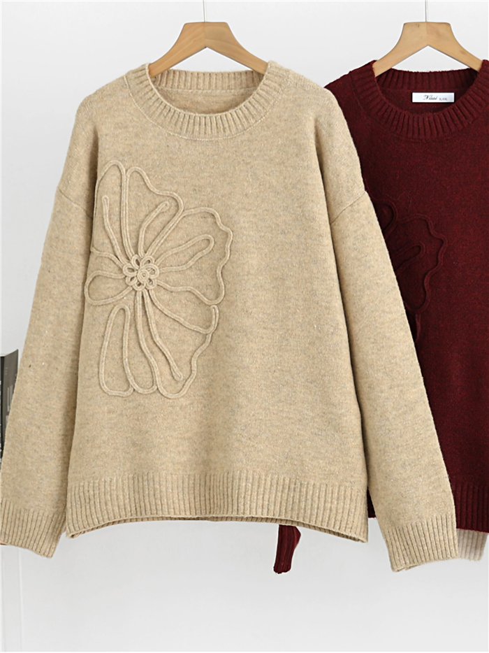 Pull en maille à lacets fleuris