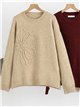 Pull en maille à lacets fleuris