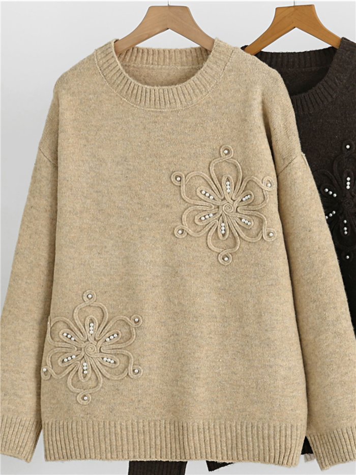 Jersey de punto con flores y perlas