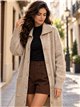 Chaqueta larga de punto cuello solapa