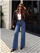 Jeans wide leg con faja