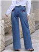 Jeans wide leg con lazos bordados