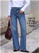 Jeans wide leg con lazos bordados