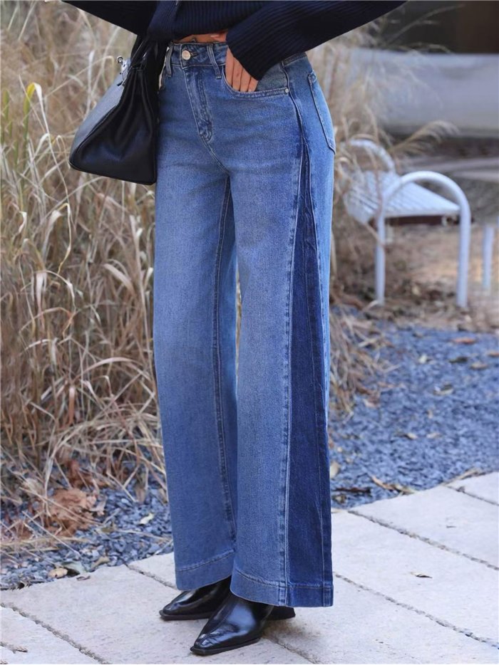 Calça jeans de perna larga com costura frontal contrastante.