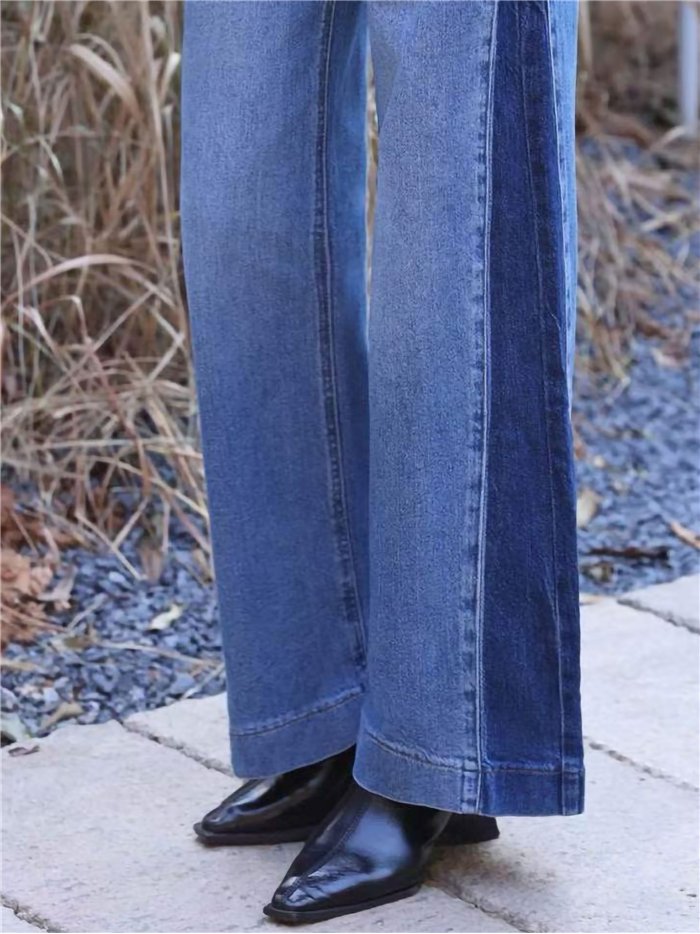 Calça jeans de perna larga com costura frontal contrastante.