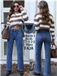 Jeans wide leg con faja y bolsillos