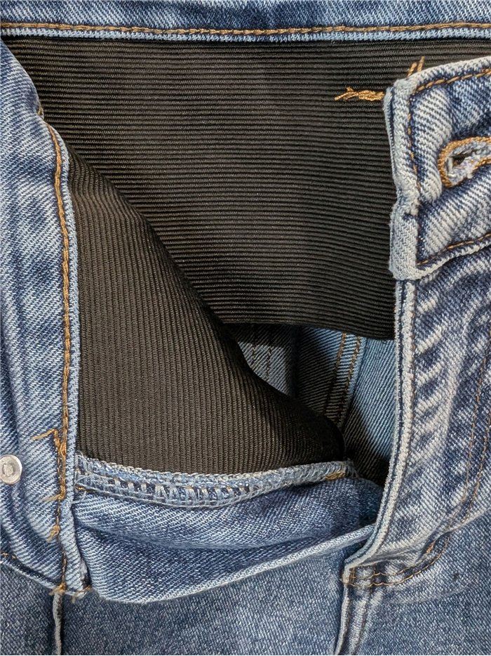 Jeans wide leg con faja y bolsillos