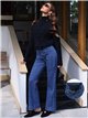 Jeans wide leg azul con faja y bolsillos