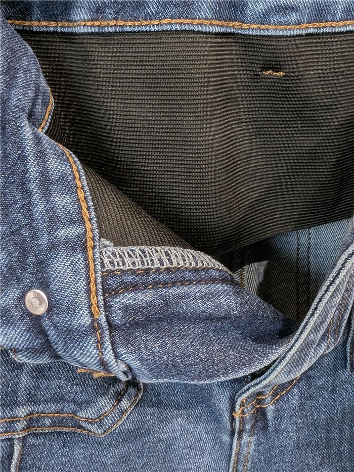 Jeans wide leg azul con faja y bolsillos