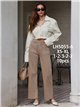 Jeans wide leg beige con bolsillos de plastrón