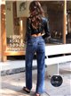 Jeans wide leg con faja y bolsillos con solapa