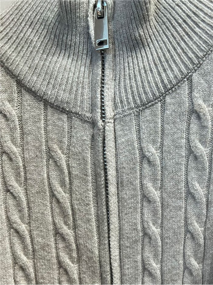 Veste en maille torsadée avec demi-zip