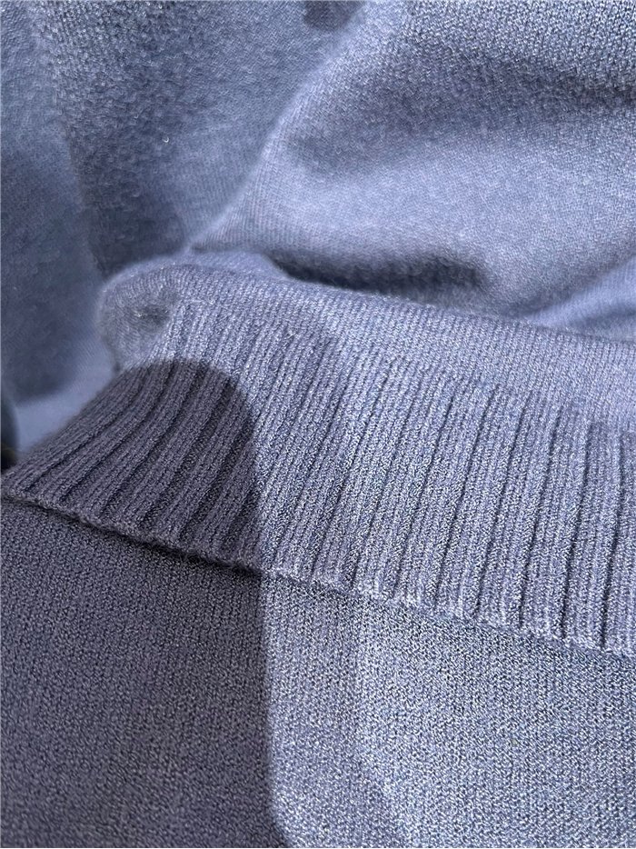 Conjunto jersey cuello alto y pantalón