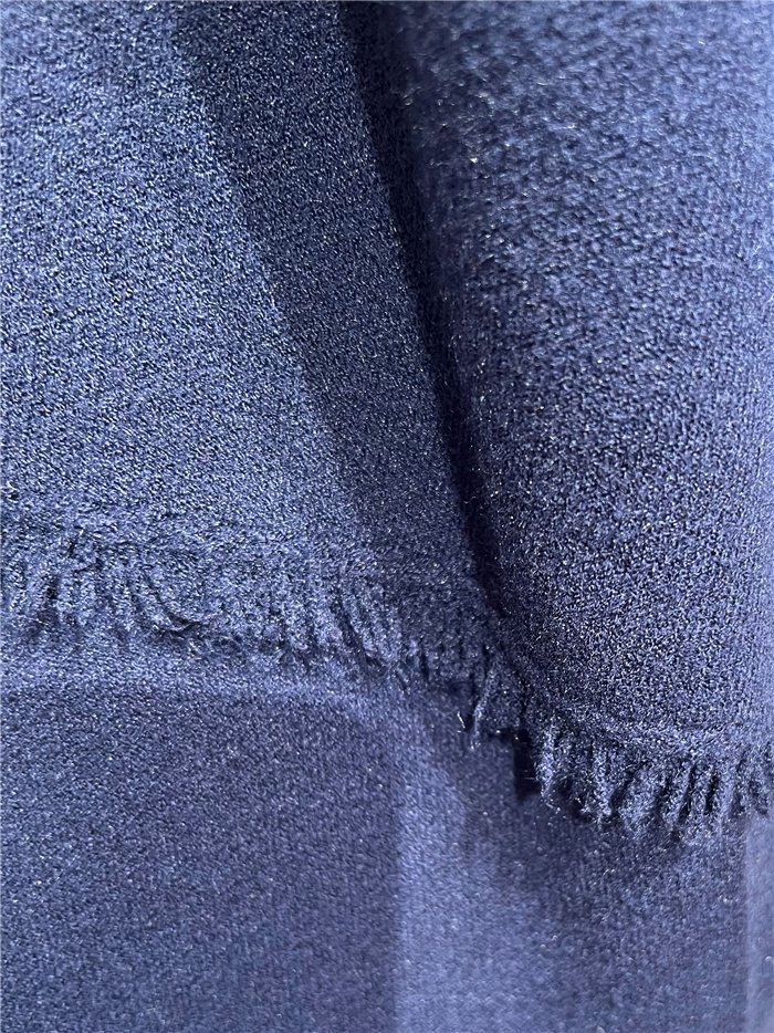 Conjunto jersey bajo desflecado y pantalón