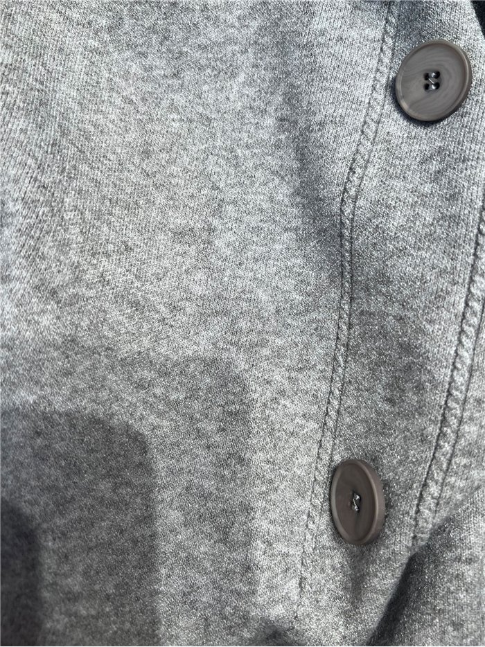 Jersey amplio con botones laterales