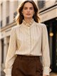 Blusa rayas con cuello volante