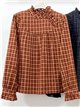 Blusa de cuadros con cuello volante