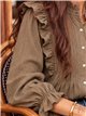 Blusa con volantes y pliegues