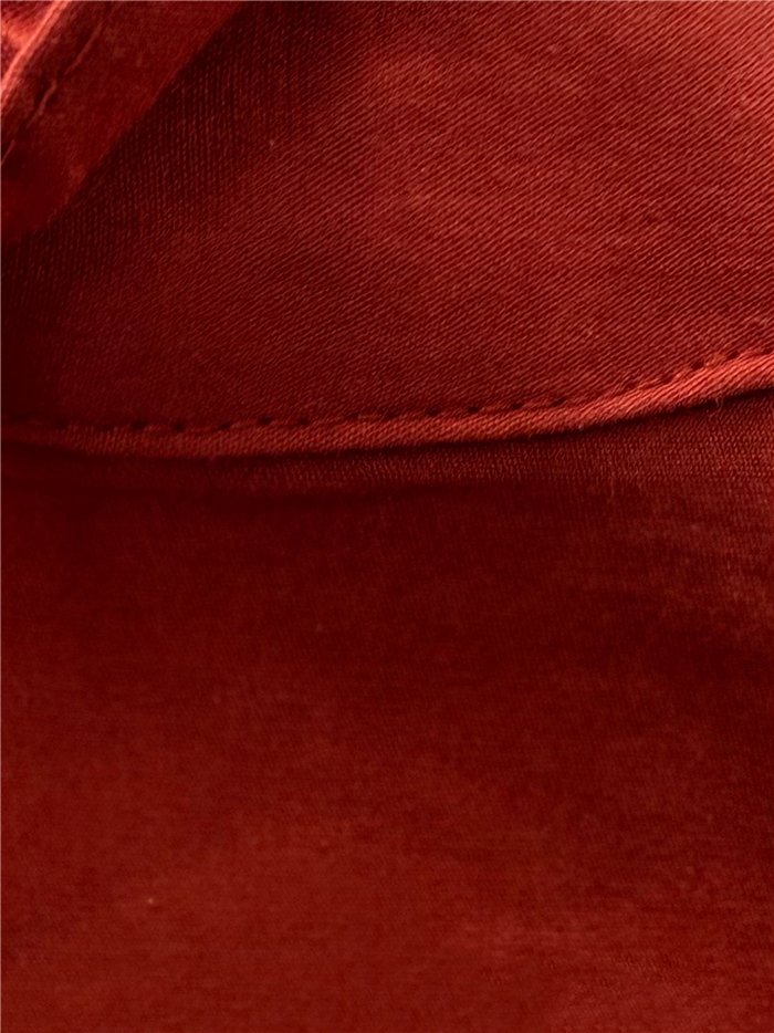 Blusa con volantes y pliegues
