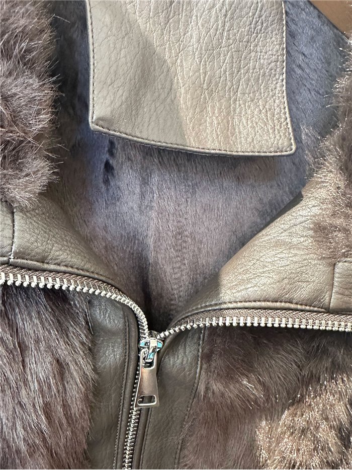 Faux fur and leather look jacket