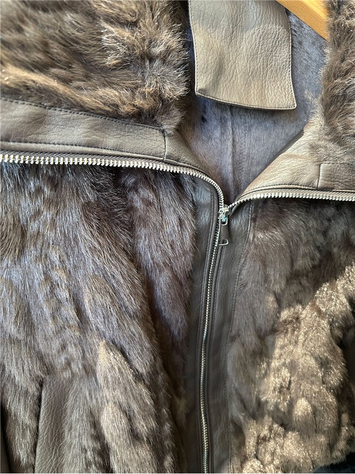 Faux fur and leather look jacket