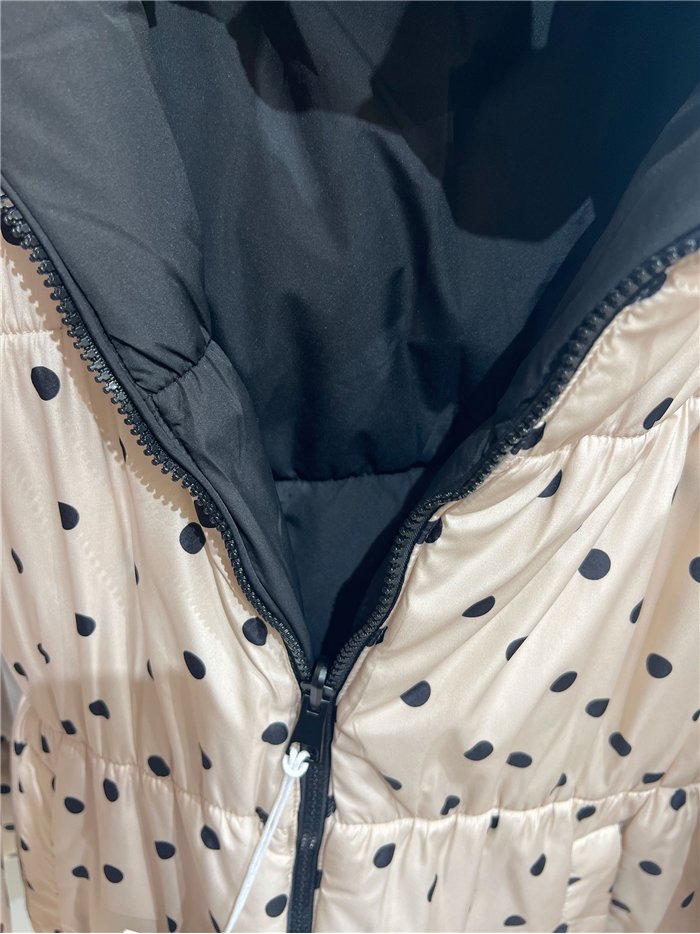Chaqueta reversible acolchada de lunares con capucha